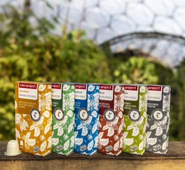 A view of all Eden coffees with the rainforest biome in the background